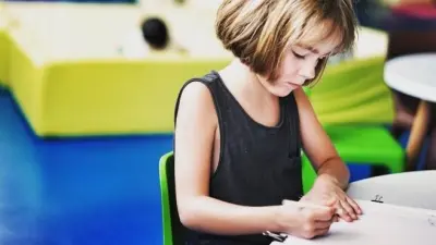 Young girl drawing picture