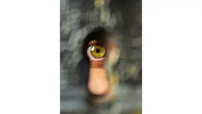 Open eye through a key hole