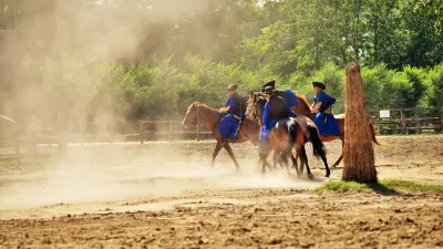 Men riding horses